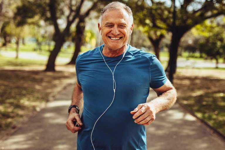 dentist in rockville | man running in park