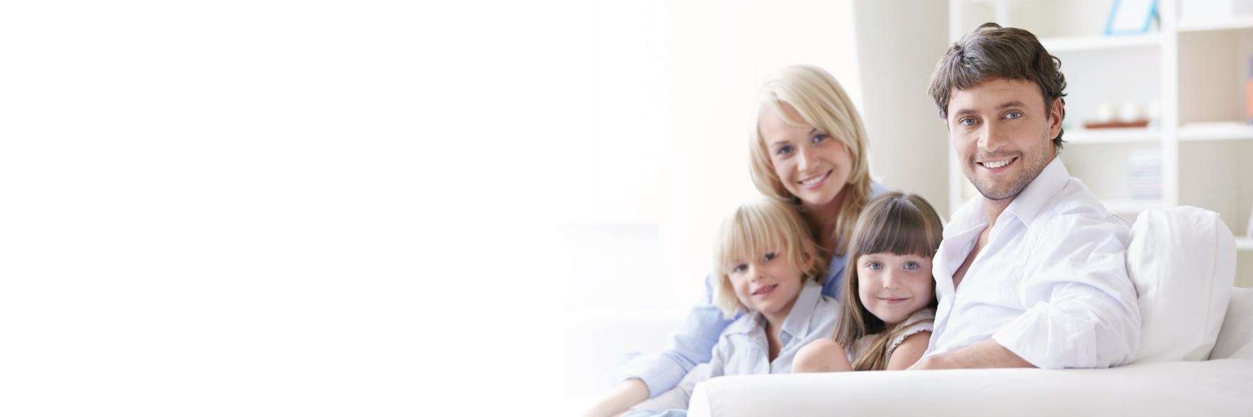 family of four hugging | dentist rockville md