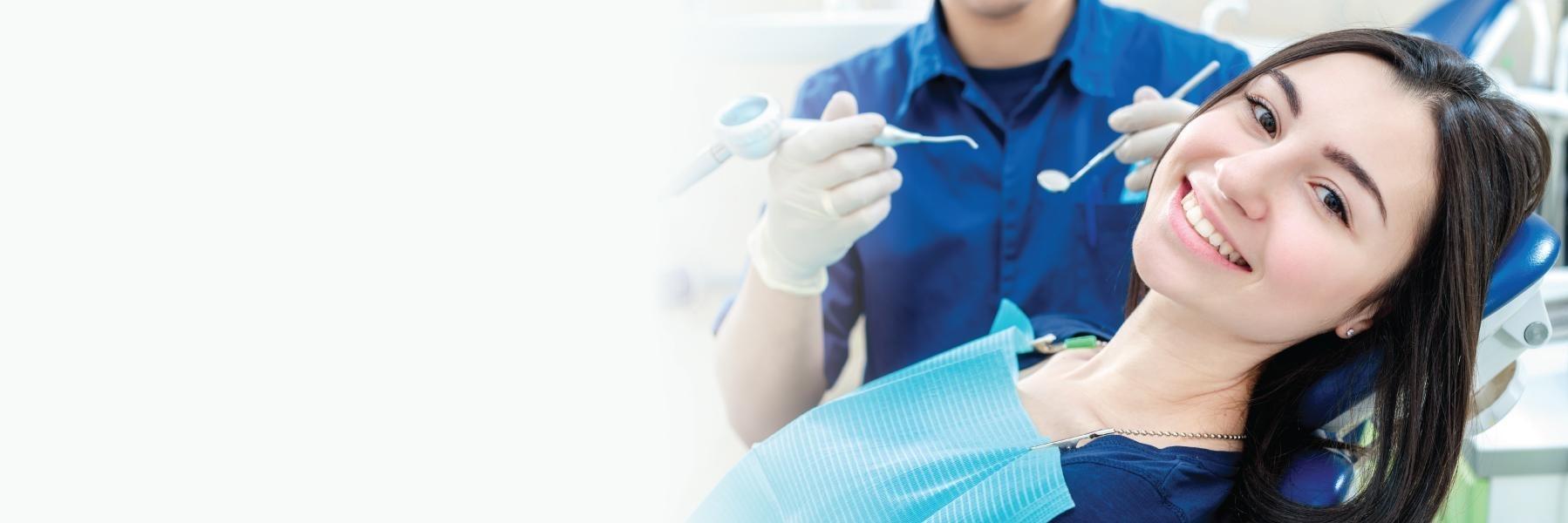 Patient getting a dental exam in Rockville, MD